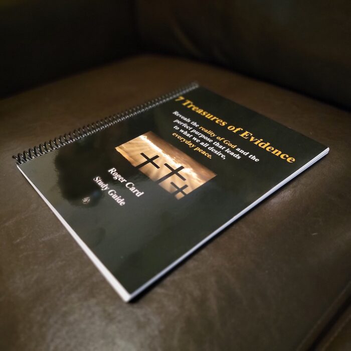 7 Treasures of Evidence Book Laying on Brown Leather Couch